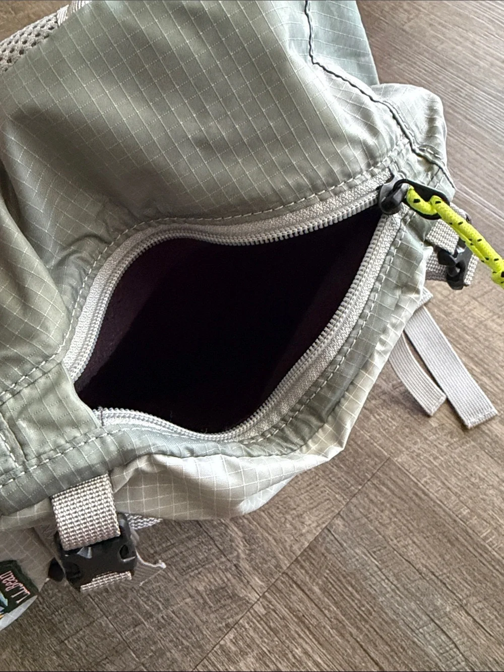 L.L. Bean Stowaway Sling Pack Light Gray with Neon Accents
